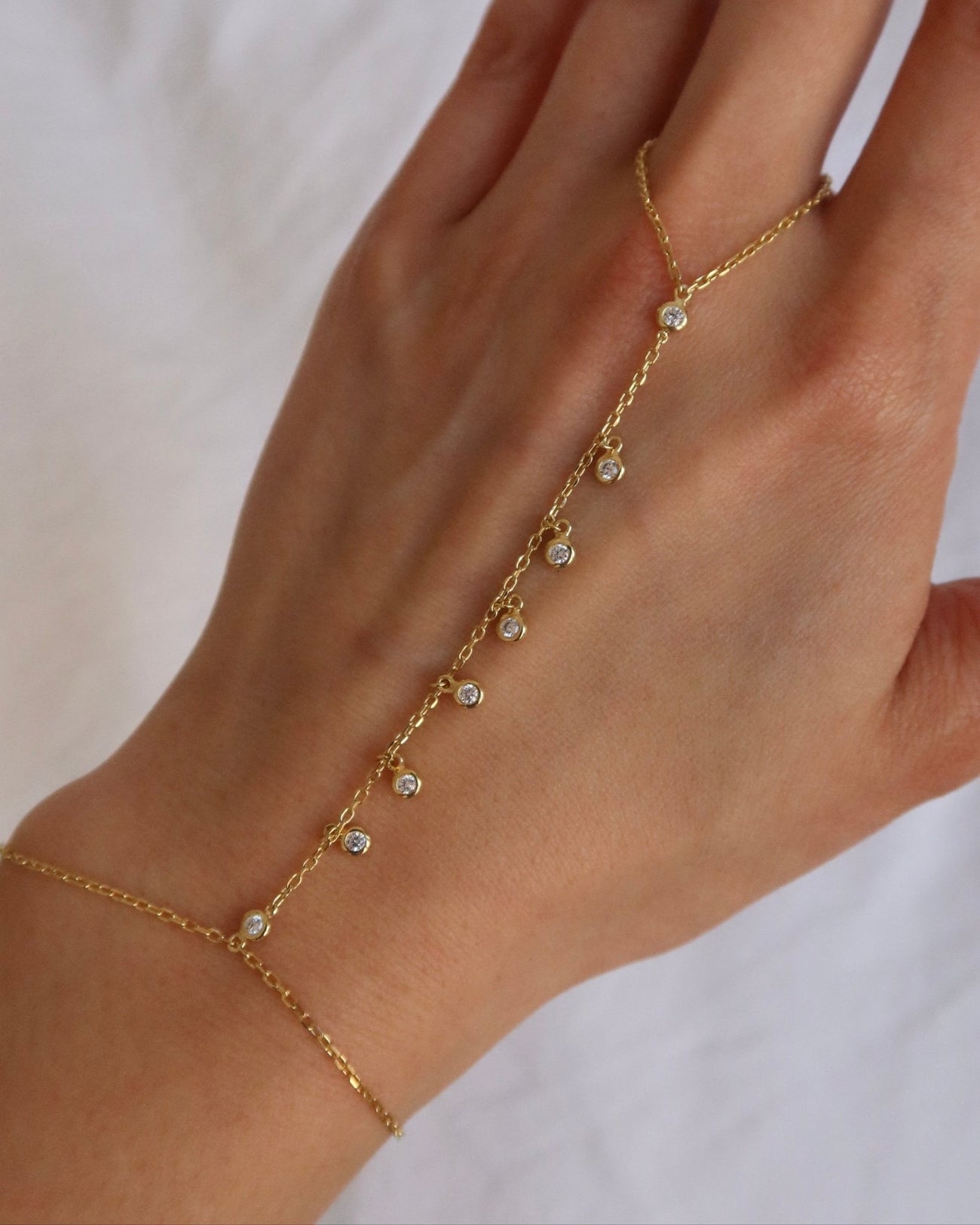 OLIVIA BEZEL CZ SHAKER HAND CHAIN - Shop Cupcakes and Cashmere